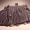 Gray satin clutch with pleated pattern with chain and gray pearls and agate