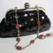 Mini-clutch with pailletes and red jasper