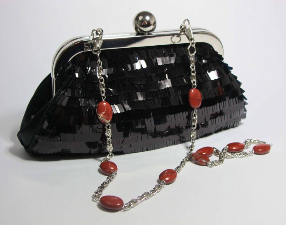 Mini-clutch with pailletes and red jasper