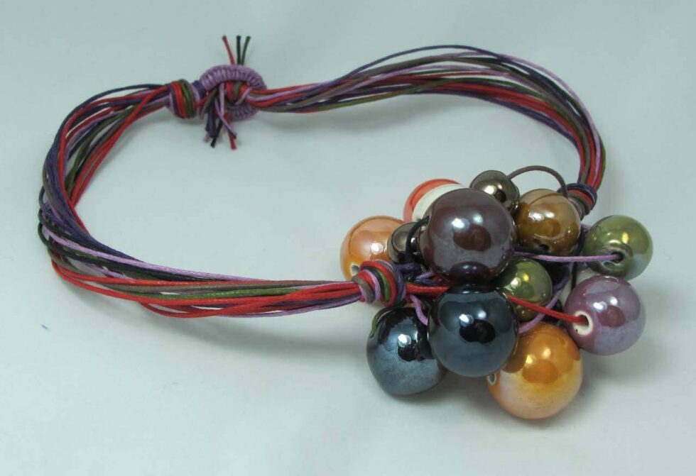 Necklace with a grape of ceramic