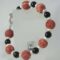 Bracelet with madrepora (sponge coral), pearls and onyx
