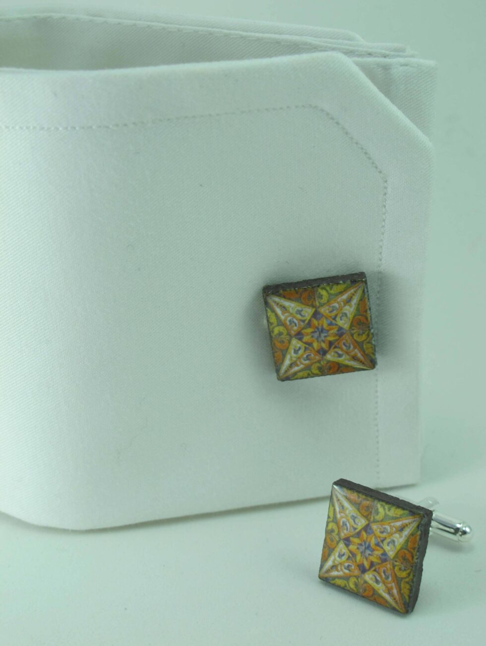 Cufflinks with enamelled lava lapilli