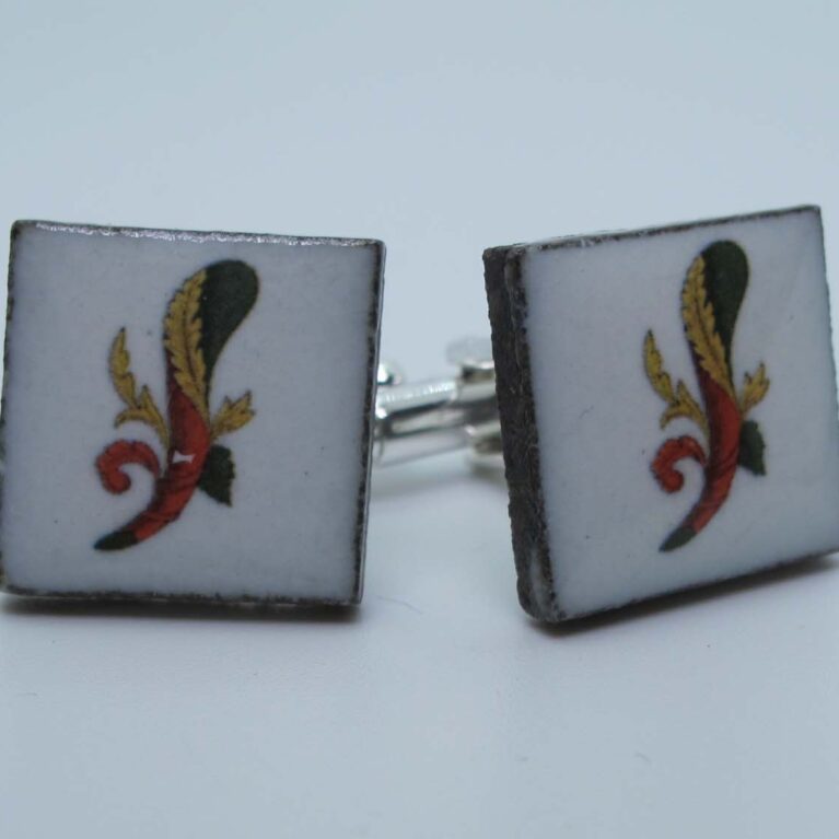 Cufflinks with enamelled lava lapilli (asso design)