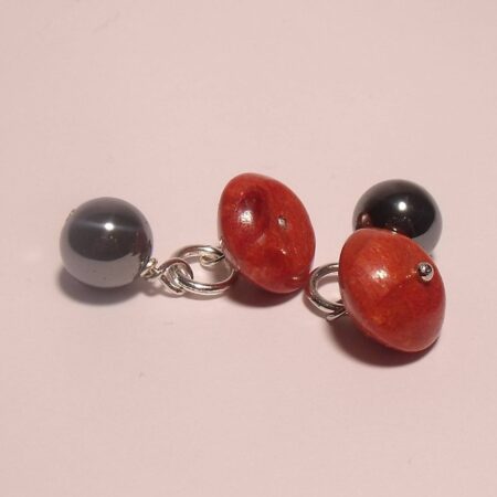 Cufflinks with red madrepora and hematite