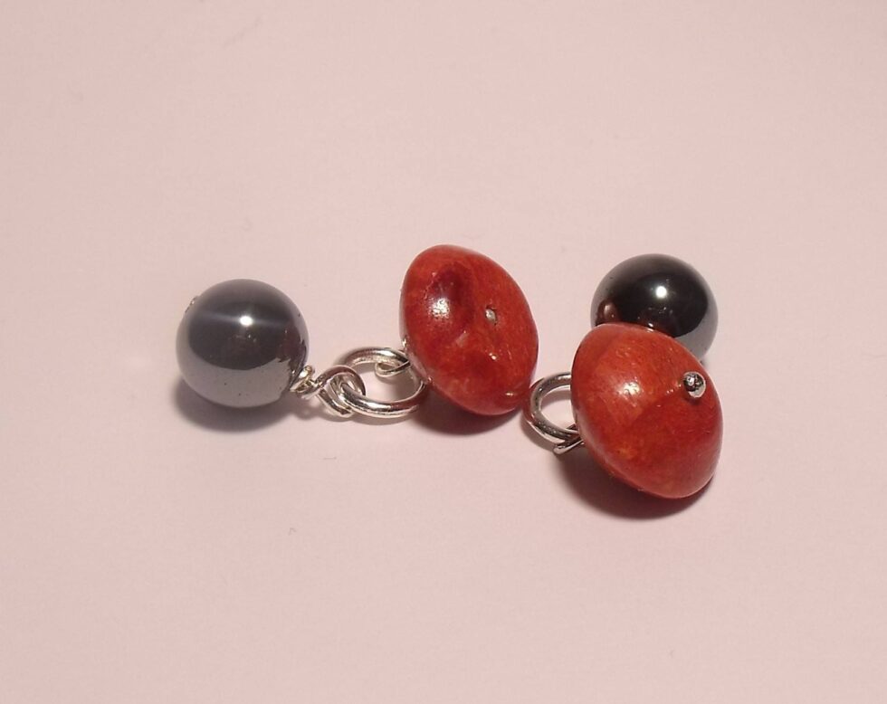 Cufflinks with red madrepora and hematite