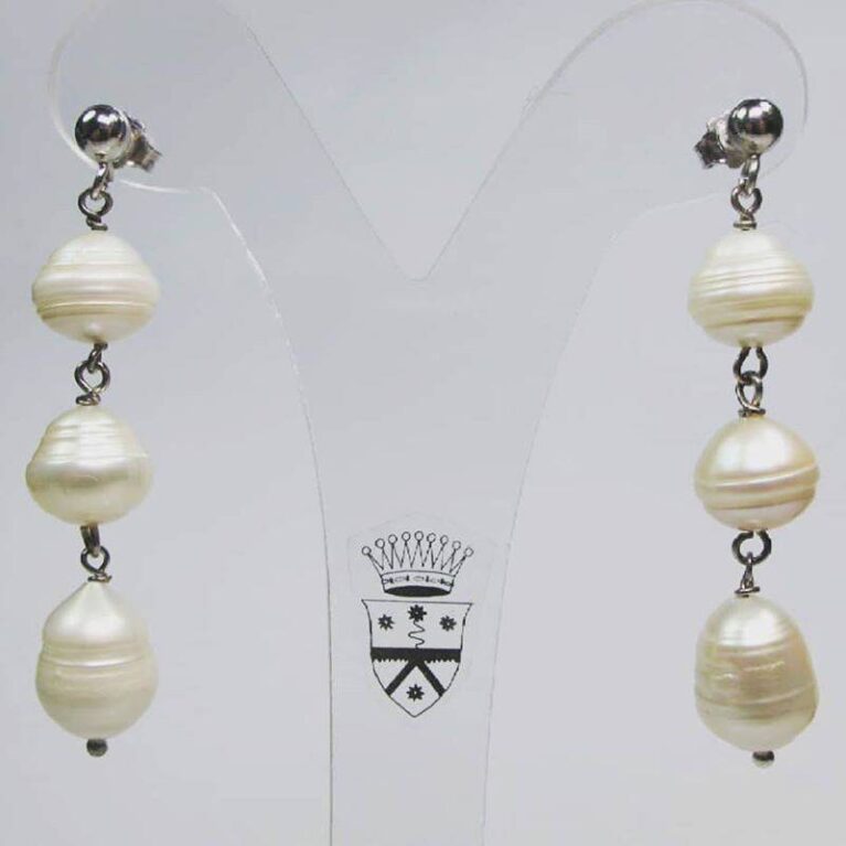 Silver earrings with three pearls