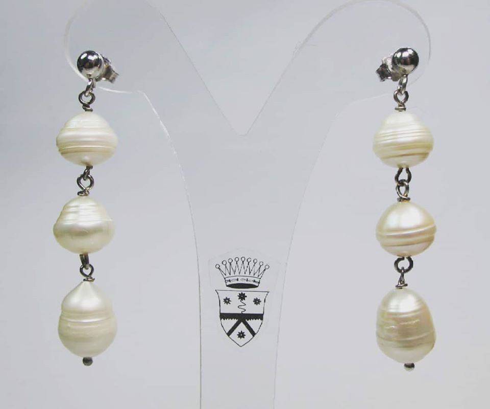 Silver earrings with three pearls