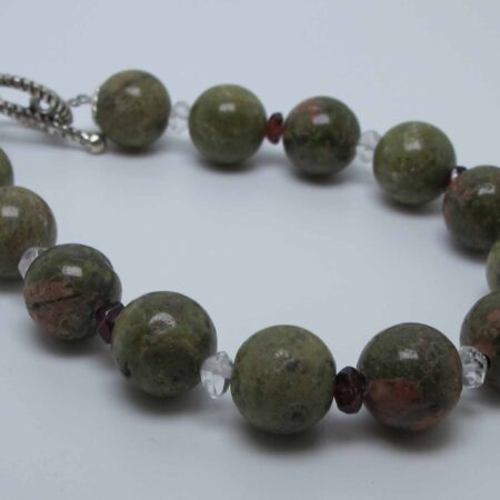 Bracelet with unakite, peridot, iolite, garnet and rocky quartz
