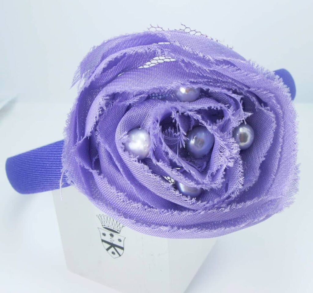Headband with lilac chiffon camelia and pearls