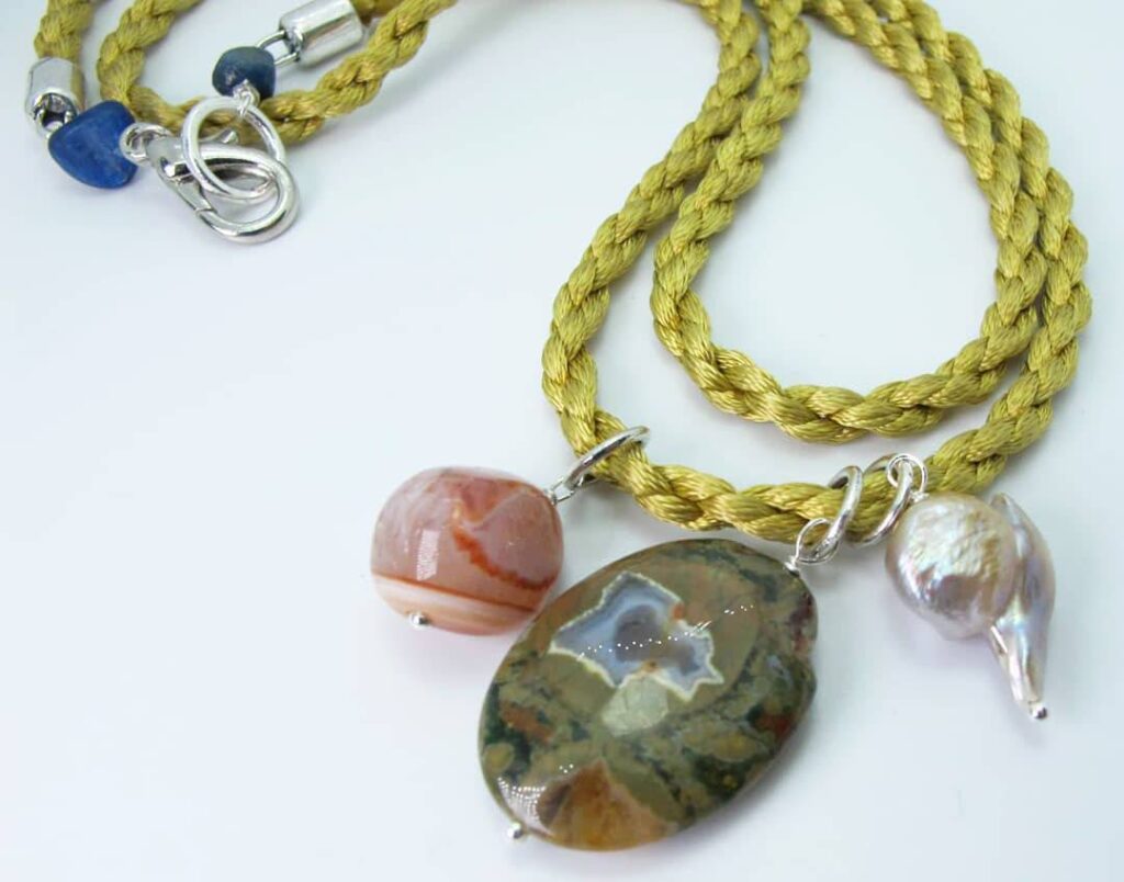 Gold silk necklace with rhyolite, agate and baroque pearl