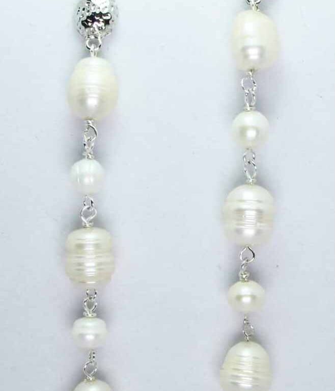 Long earrings with white baroque freshwater pearls