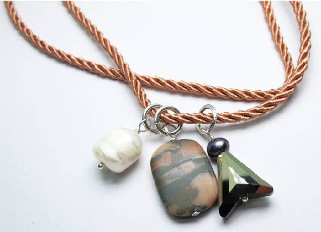 Pink silk necklace with baroque pearl, jasper, peacock pearl and Swarovski crystal