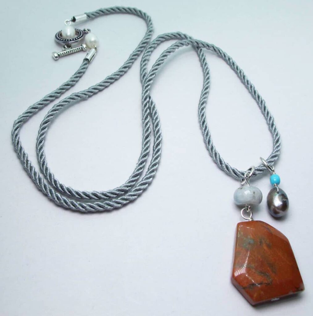Grey silk necklace with red jasper, aquamarine, turquoise and peacock pearl