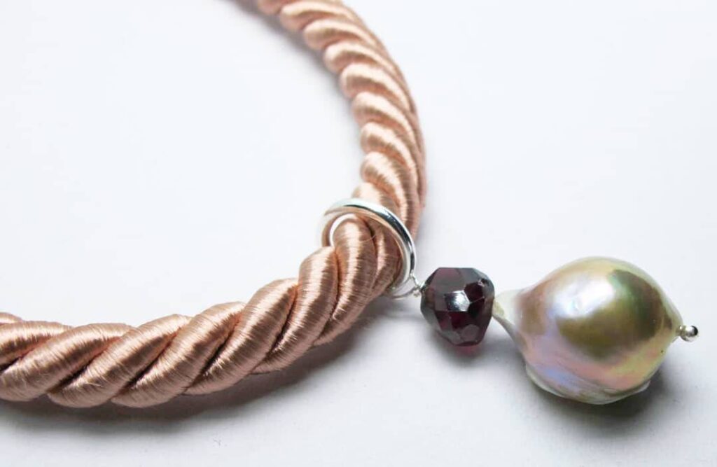 Pink silk necklace with big baroque pearl and garnet