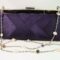 Clutch in purple satin and chain necklace with freshwater pearls, labradorite, aquamarine and amethyst