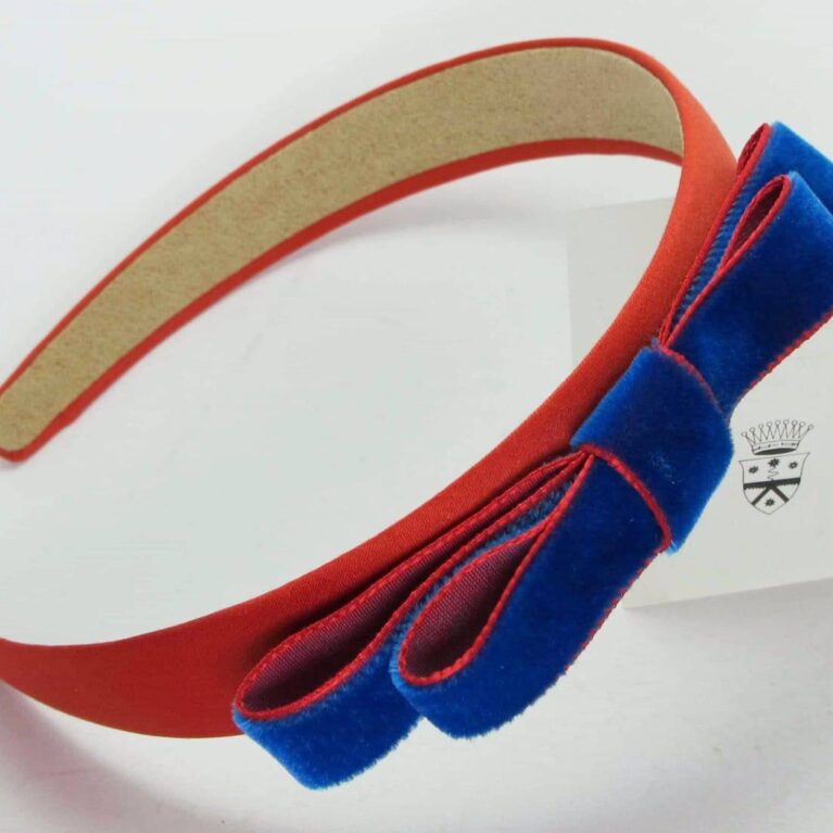 Light orange satin headband with electric blue velvet bow