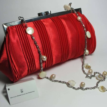 Satin clutch with mother of pearl and white pearls