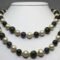 Long necklace with pearls, amethyst, labradorite, garnet and peridot