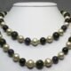 Long necklace with pearls, amethyst, labradorite, garnet and peridot
