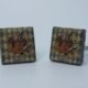 Cufflinks with enamelled lava lapilli (White Rabbit design)