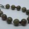 Bracelet with unakite, peridot, iolite, garnet and rocky quartz