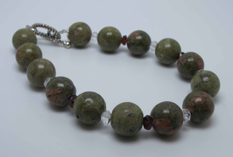 Bracelet with unakite, peridot, iolite, garnet and rocky quartz