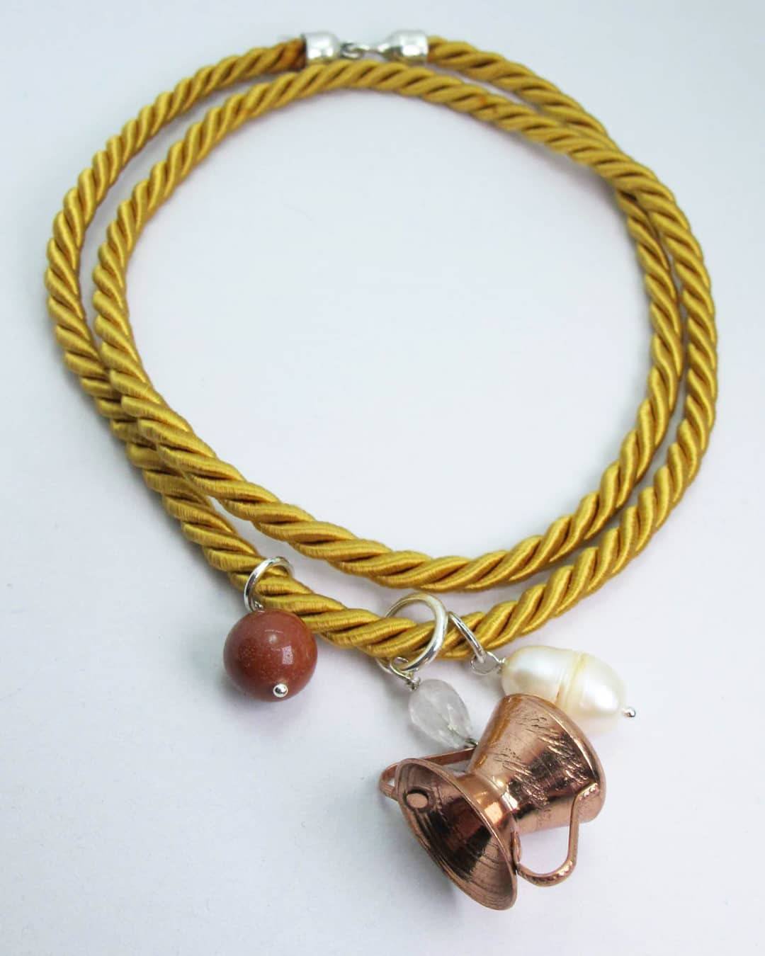 Gold silk necklace with baroque pearl, grey quartz, copper conca and red jasper