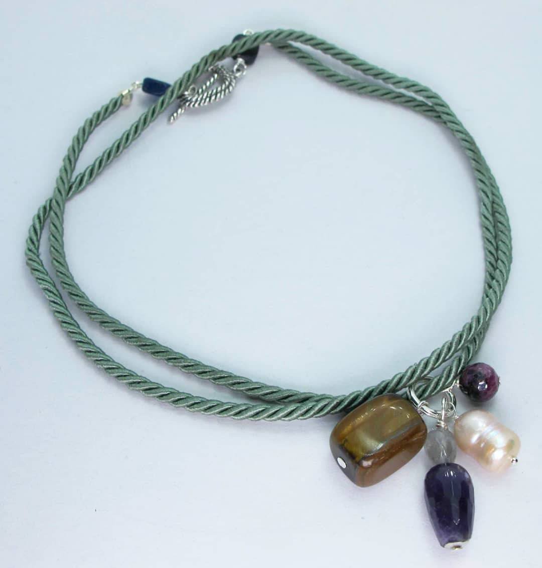 Green sage silk necklace with tiger eye, amethyst, grey quartz, pearl and rubyzoisite